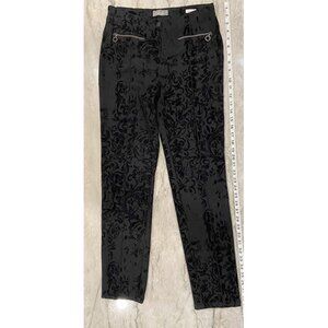 Vanilia: Black stretchy black pants with velvet burnout-like surface. Size 8